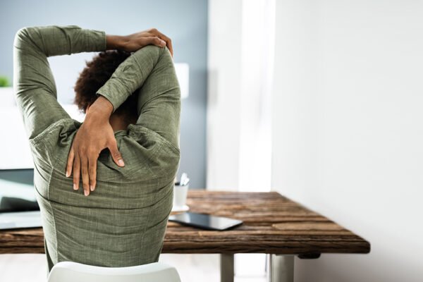 5 Easy Stretches You Can Do At Your Desk