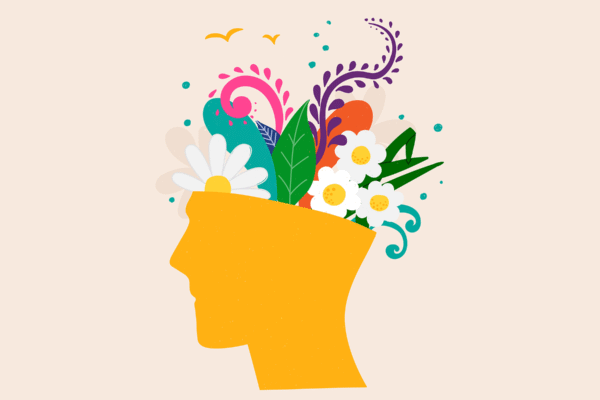 A 2 Minute Practice to Calm Anxiety and Nurture Curiosity Abstract image of a head with flowers insi.png