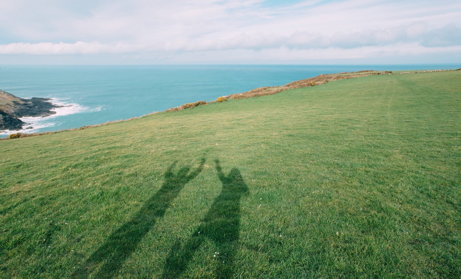 friends shadows jumping scaled.jpeg